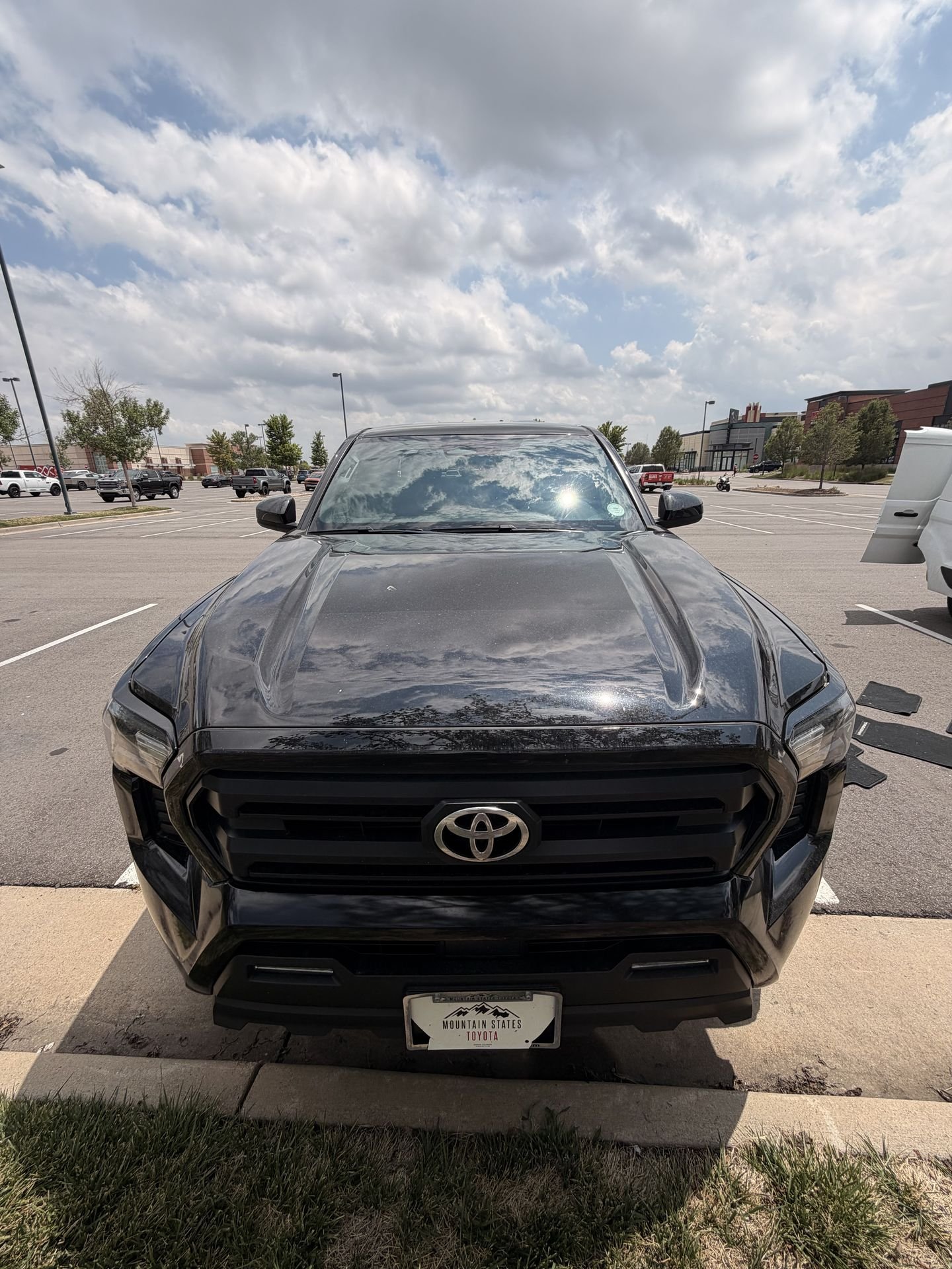 Black Toyota before mobile detailing Denver