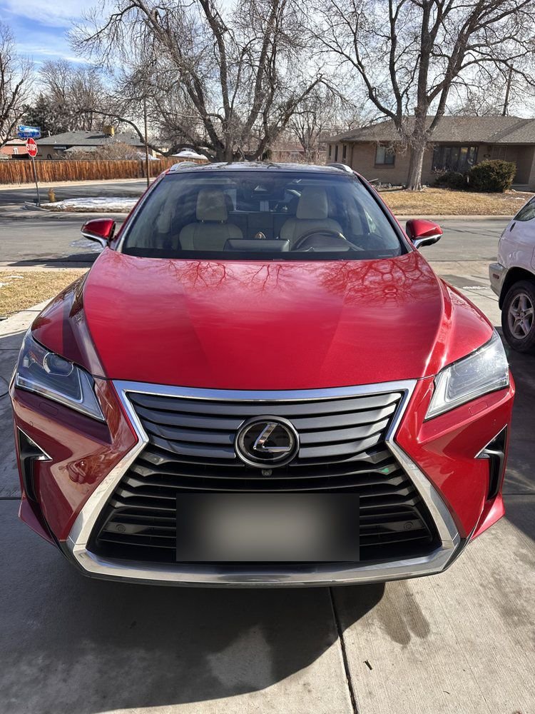 Red Lexus after mobile detailing Denver