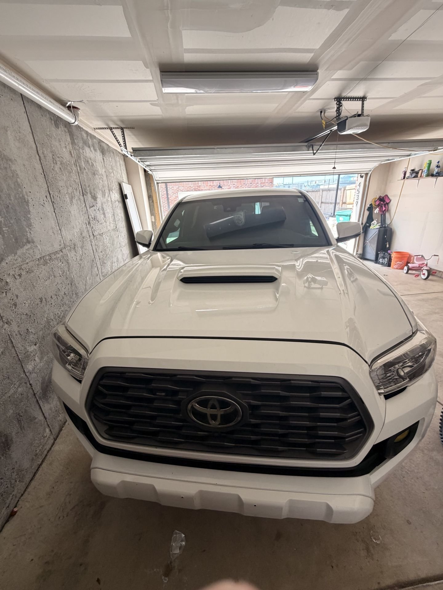 White Toyota before mobile detailing Denver